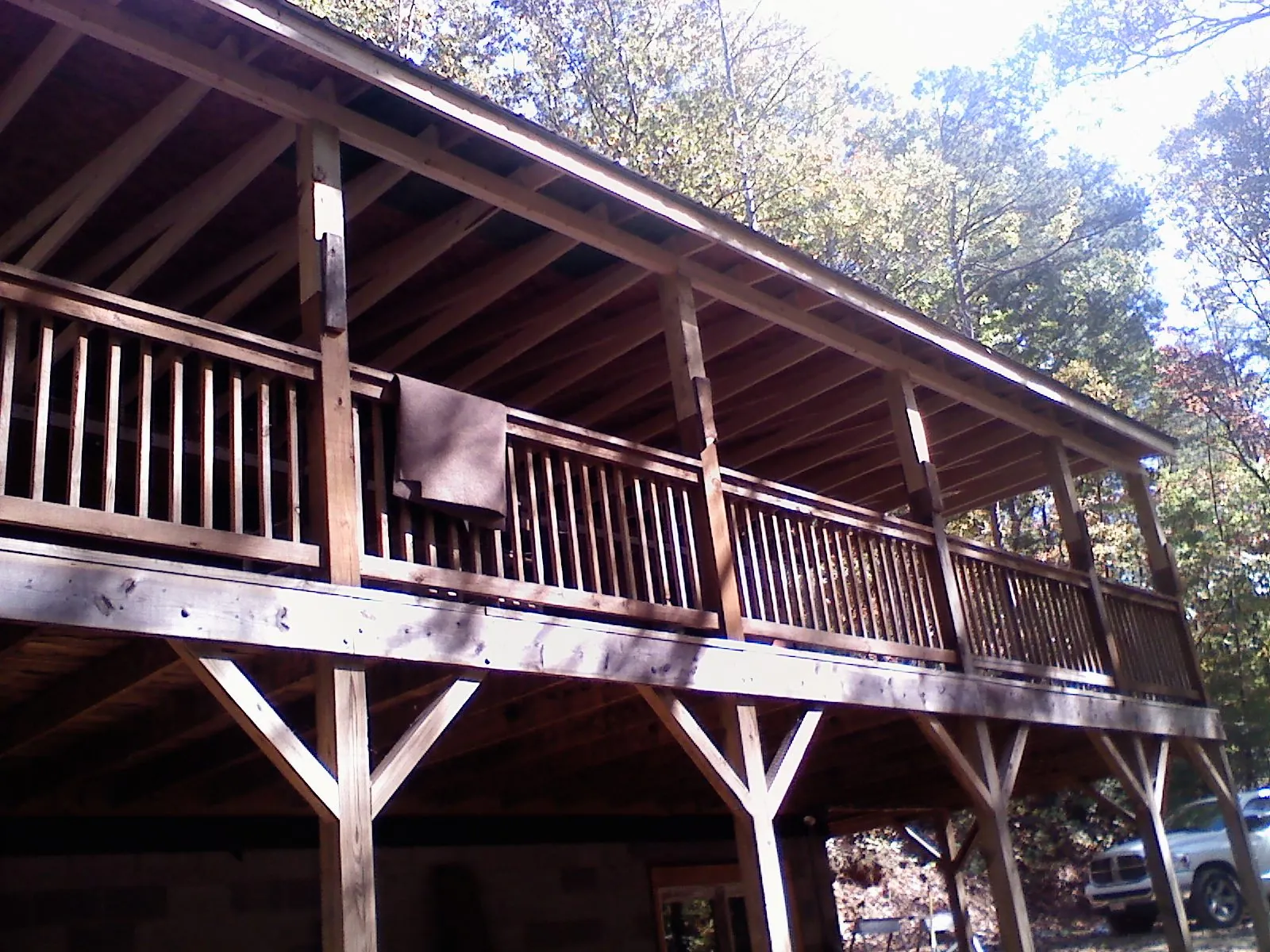 Timber framing under a new elevated porch and deck — Roof Leak Repair in Scipio by Roofing Brothers